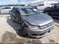 2015 Volkswagen Passat — photo 1 of 15 | VIN 1VWAT7A31FC091118