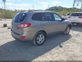 2011 Hyundai Santa Fe — photo 4 of 11 | VIN 5XYZGDABXBG075005