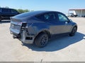 2023 Tesla Model Y — photo 4 of 17 | VIN 7SAYGDEE5PA075475