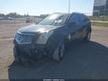 2015 Cadillac SRX — photo 2 of 18 | VIN 3GYFNBE35FS557461
