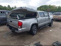 2018 Toyota Tacoma — photo 4 of 12 | VIN 3TMAZ5CN9JM071095