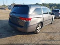 2014 Honda Odyssey — photo 4 of 17 | VIN 5FNRL5H48EB083303