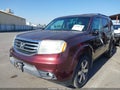 2012 Honda Pilot — photo 2 of 18 | VIN 5FNYF4H93CB078600