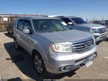 2012 Honda Pilot — photo 13 of 16 | VIN 5FNYF4H71CB085446