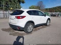 2014 Mazda CX-5 — photo 4 of 17 | VIN JM3KE4DY0E0350552