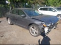 2015 Volkswagen Passat — photo 1 of 16 | VIN 1VWBT7A35FC011341