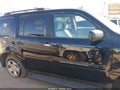 2014 Honda Pilot — photo 13 of 16 | VIN 5FNYF4H21EB025450