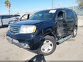 2014 Honda Pilot — photo 2 of 16 | VIN 5FNYF4H21EB025450