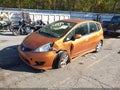 2009 Honda Fit — photo 2 of 16 | VIN JHMGE88459S044047
