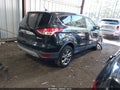2013 Ford Escape — photo 4 of 16 | VIN 1FMCU9H99DUA09458