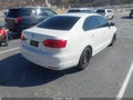 2014 Volkswagen Jetta — photo 4 of 16 | VIN 3VW2K7AJ7EM359818