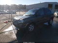 2007 Hyundai Tucson — photo 2 of 12 | VIN KM8JN12DX7U635740