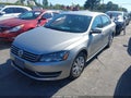 2013 Volkswagen Passat — photo 2 of 11 | VIN 1VWAP7A30DC102644