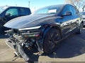 2026 Tesla Model Y — photo 2 of 20 | VIN 7SAYGDED7TF525180