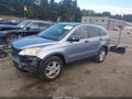 2011 Honda CR-V — photo 2 of 17 | VIN JHLRE4H52BC012266