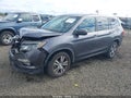 2018 Honda Pilot — photo 2 of 22 | VIN 5FNYF6H52JB008317