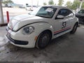 2015 Volkswagen Beetle — photo 2 of 17 | VIN 3VWJ17AT0FM635869