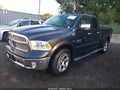 2014 Ram 1500 — photo 2 of 16 | VIN 1C6RR7JT9ES169919