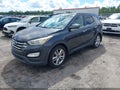 2015 Hyundai Santa Fe — photo 2 of 16 | VIN 5XYZW4LA4FG266402