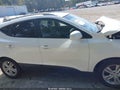 2013 Hyundai Tucson — photo 12 of 15 | VIN KM8JU3AC0DU637841