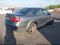 2010 Volkswagen Jetta — photo 4 of 11 | VIN 3VWAZ7AJ7AM121551