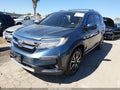 2022 Honda Pilot — photo 2 of 16 | VIN 5FNYF5H65NB024603