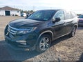 2016 Honda Pilot — photo 2 of 19 | VIN 5FNYF6H50GB031684