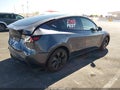 2023 Tesla Model Y — photo 4 of 14 | VIN 7SAYGDEE9PF625506