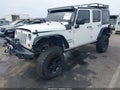 2013 Jeep Wrangler Unlimited — photo 2 of 17 | VIN 1C4BJWDG3DL559224