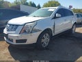 2013 Cadillac SRX — photo 2 of 11 | VIN 3GYFNCE30DS508252