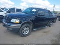 2003 Ford F-150 — photo 2 of 16 | VIN 1FTRX18L13NA60867