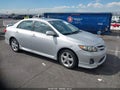 2012 Toyota Corolla — photo 1 of 13 | VIN 2T1BU4EE7CC858665