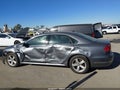 2015 Volkswagen Passat — photo 14 of 17 | VIN 1VWBT7A38FC059545