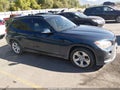 2014 BMW X1 — photo 13 of 16 | VIN WBAVM1C59EVW56194