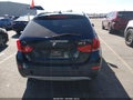2014 BMW X1 — photo 16 of 16 | VIN WBAVM1C59EVW56194