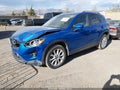 2014 Mazda CX-5 — photo 2 of 16 | VIN JM3KE4DY9E0352977