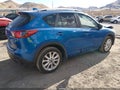 2014 Mazda CX-5 — photo 4 of 16 | VIN JM3KE4DY9E0352977