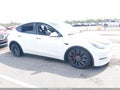2022 Tesla Model Y — photo 13 of 16 | VIN 7SAYGDEF0NF507592