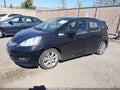2009 Honda Fit — photo 2 of 16 | VIN JHMGE88429S023060