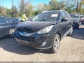 2014 Hyundai Tucson — photo 2 of 16 | VIN KM8JU3AG0EU893661