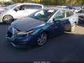 2018 Subaru Impreza — photo 2 of 21 | VIN 4S3GKAU64J3611016