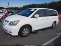 2009 Honda Odyssey — photo 2 of 11 | VIN 5FNRL38609B411504