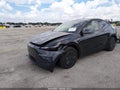 2026 Tesla Model Y — photo 2 of 18 | VIN 7SAYGDEE8TA636536