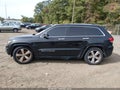 2015 Jeep Grand Cherokee — photo 13 of 15 | VIN 1C4RJFCT9FC825779