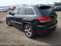2015 Jeep Grand Cherokee — photo 3 of 15 | VIN 1C4RJFCT9FC825779