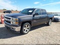 2014 Chevrolet Silverado 1500 — photo 2 of 11 | VIN 3GCUKREC2EG128004