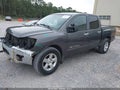 2007 Nissan Titan — photo 2 of 17 | VIN 1N6AA07BX7N237288