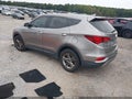 2017 Hyundai Santa Fe — photo 3 of 15 | VIN 5XYZTDLB1HG437899