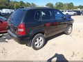 2009 Hyundai Tucson — photo 4 of 17 | VIN KM8JM12B69U135644