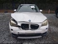 2014 BMW X1 — photo 12 of 16 | VIN WBAVM1C57EVW52791